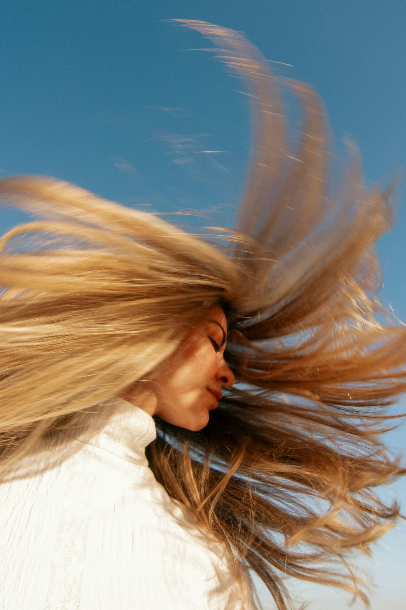 Person smiling outdoors